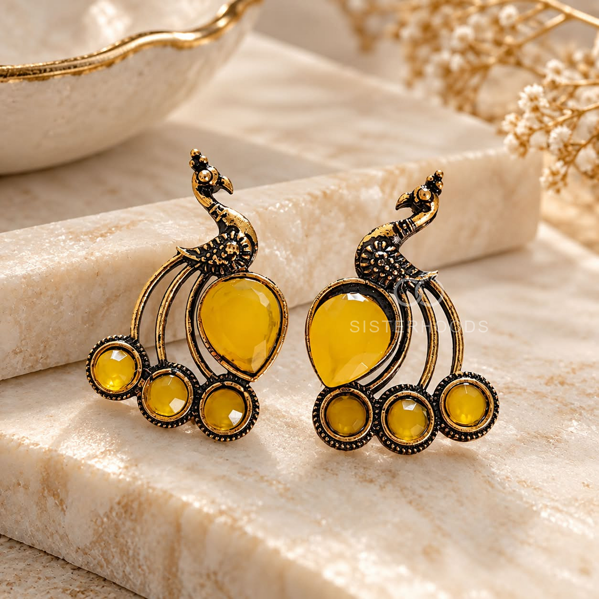Oxidized peacock-inspired dangle earring with yellow accent stones | SISTERHOODS-SHA256:e570089bd14a644388f77a8a089ad0559a1d60b2e48a8c6007b3632e2f31d3a4