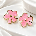 Pink flower stud earrings with gold-tone edging | SISTERHOODS-SHA256:986c49a439c3750395daac15fa7121e735f34758b15798f8fda04ab80f3ab97e