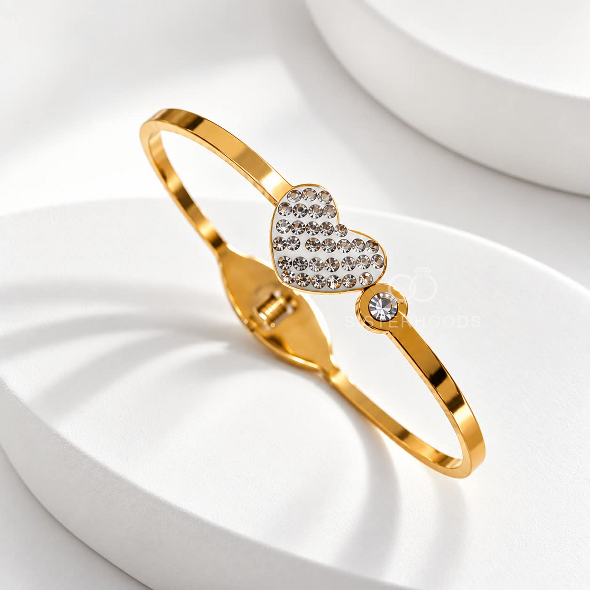 Gold-tone cuff bracelet with sparkling heart and round accents | SISTERHOODS-SHA256:00b3ee0527acb8c50f7d16b0fa7be48f1a6626f5e0db1dc70688690bcc78feba