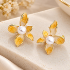 Yellow floral stud earrings with pearl-inspired centres | SISTERHOODS-SHA256:d2a846f23428475fcd1744b5542487d1ac269e54d4ba54e17390f51964d1db9b