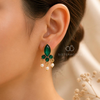 Green accent dangle earring with clustered beads and tiered white drops | SISTERHOODS-SHA256:6e3d20c740bdadcba5545c4fb6a1ce7a66384e65b77e9d9a522839a8be0de711