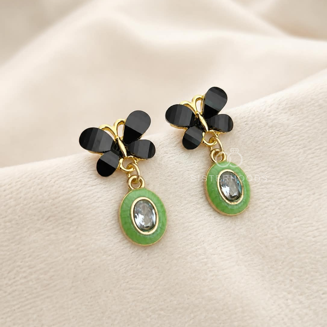 Black floral top dangle earrings with green oval accents and clear faceted centres | SISTERHOODS-SHA256:3ba5c3c847f7e9738071afc890108c60a4fbd474605fd5070fc2d41ee8e55a78