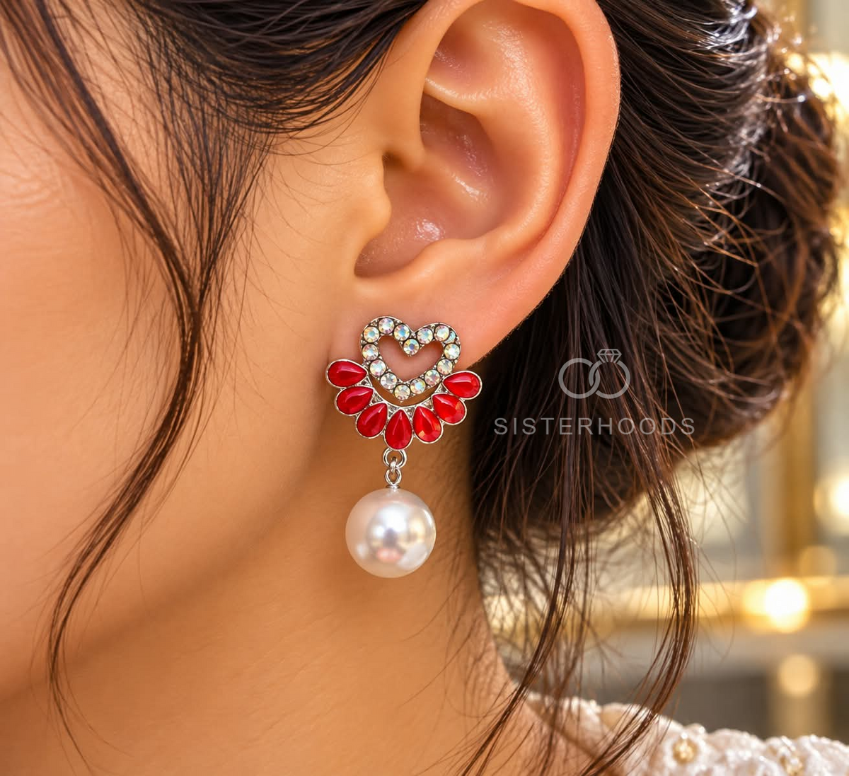Heart-shaped dangle earring with red petal accents and a white pearl drop | SISTERHOODS-SHA256:9e7f44e3df698e82952e325b7a857046ab40ea055c74e1499e8447bfdc74403e