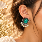 Oxidized dangle earrings with green oval centres and white bead drops | SISTERHOODS-SHA256:067f931b4f0c2c34d92d2f123fc362d5e6488cd187a35eeb80ff74feff5b2c4c