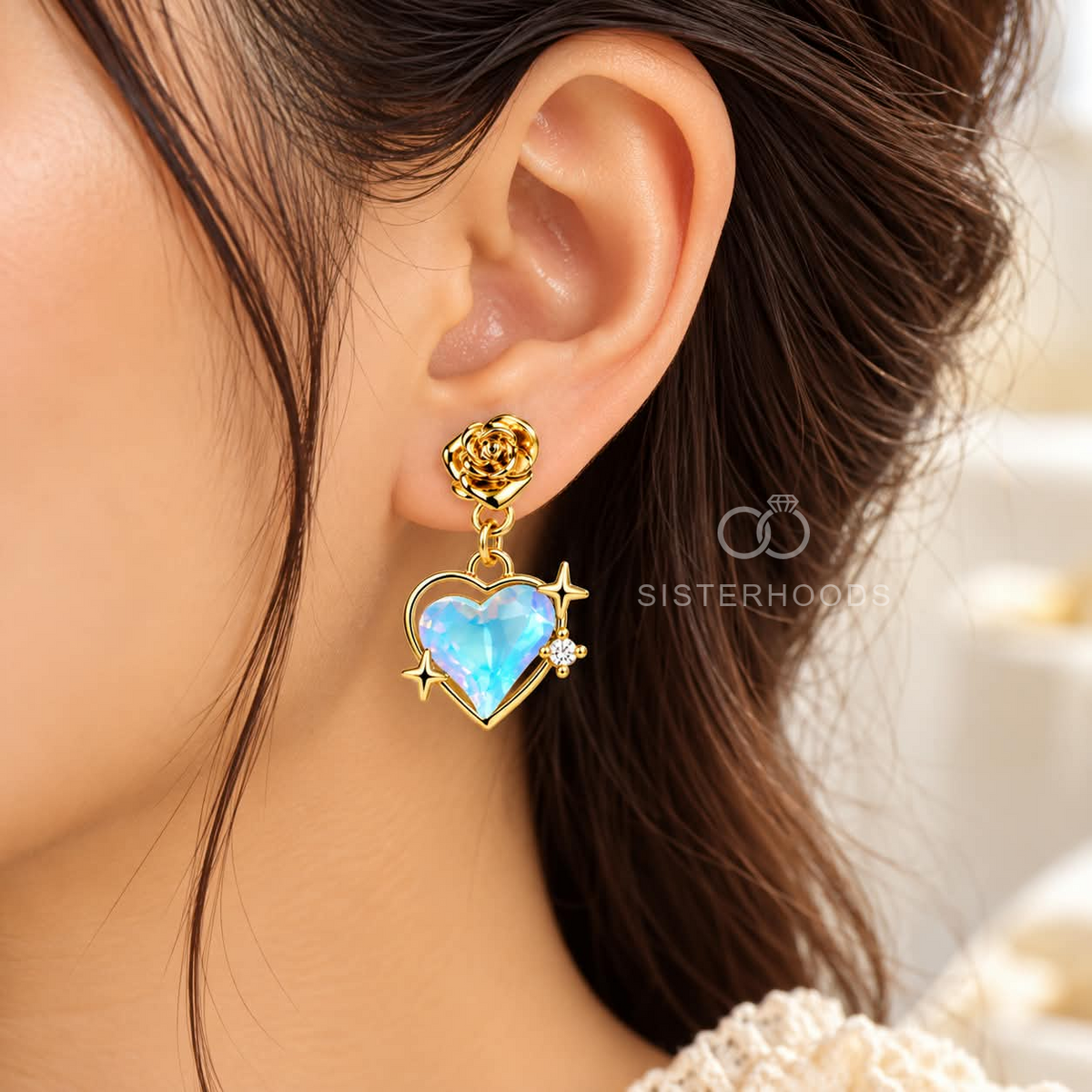 Gold-tone floral rosette earrings with faceted blue heart drops | SISTERHOODS-SHA256:a44f9776f60e4848a5692d177c769335af9400809611cdc7a630df9b044f24c3