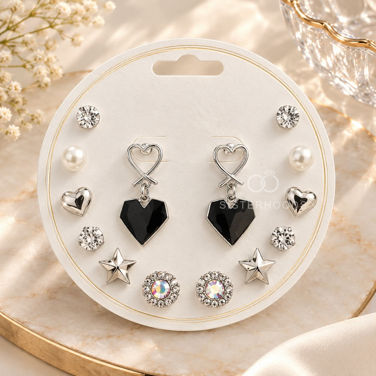 Multi-pair silver earring set with black heart, star, pearl-style and sparkling stud designs | SISTERHOODS-SHA256:122e24189988cfc60e5faed176c4148b53ff0d199b9929e1a3619c5d75c90750