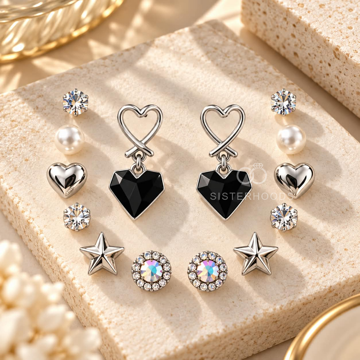 Multi-pair silver earring set with black heart, star, pearl-style and sparkling stud designs | SISTERHOODS-SHA256:4a8862128922ec2ec6a81232edca8ca0195ca8c913dcf45d8f18eb4b3c3ef106