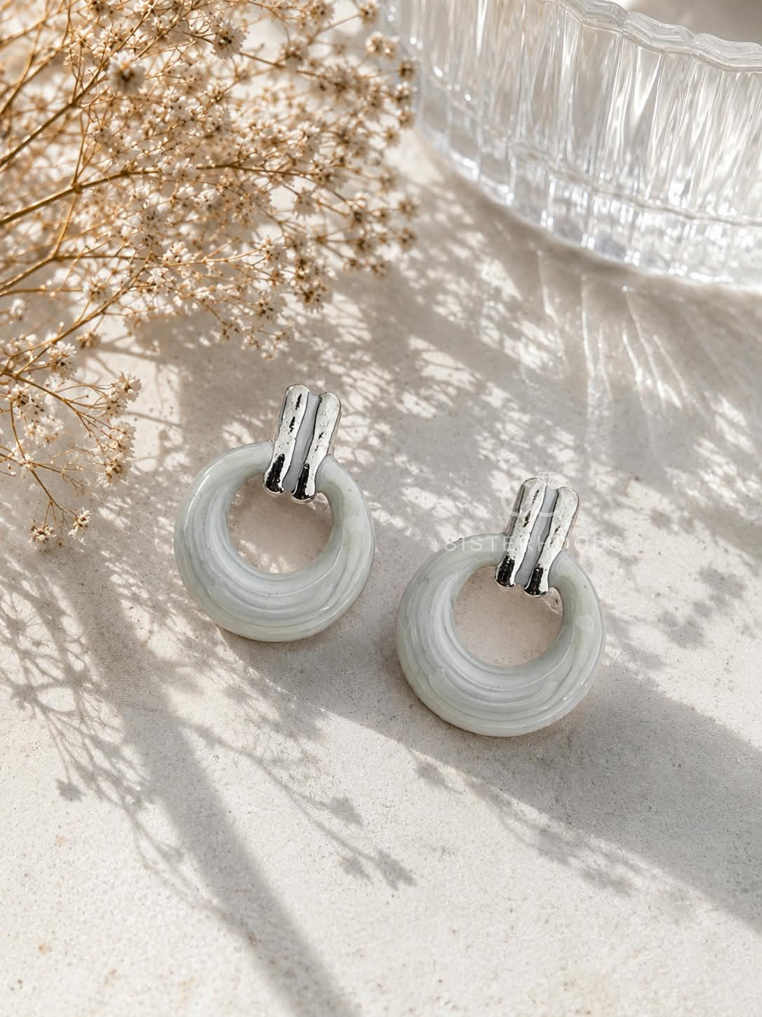 Ivory circular hoop earrings with silver-tone rectangular tops | SISTERHOODS-SHA256:e1ebe06436c3351b2d17884dbc964b8abdc6231dc102819b2e6563ddcb0f3132