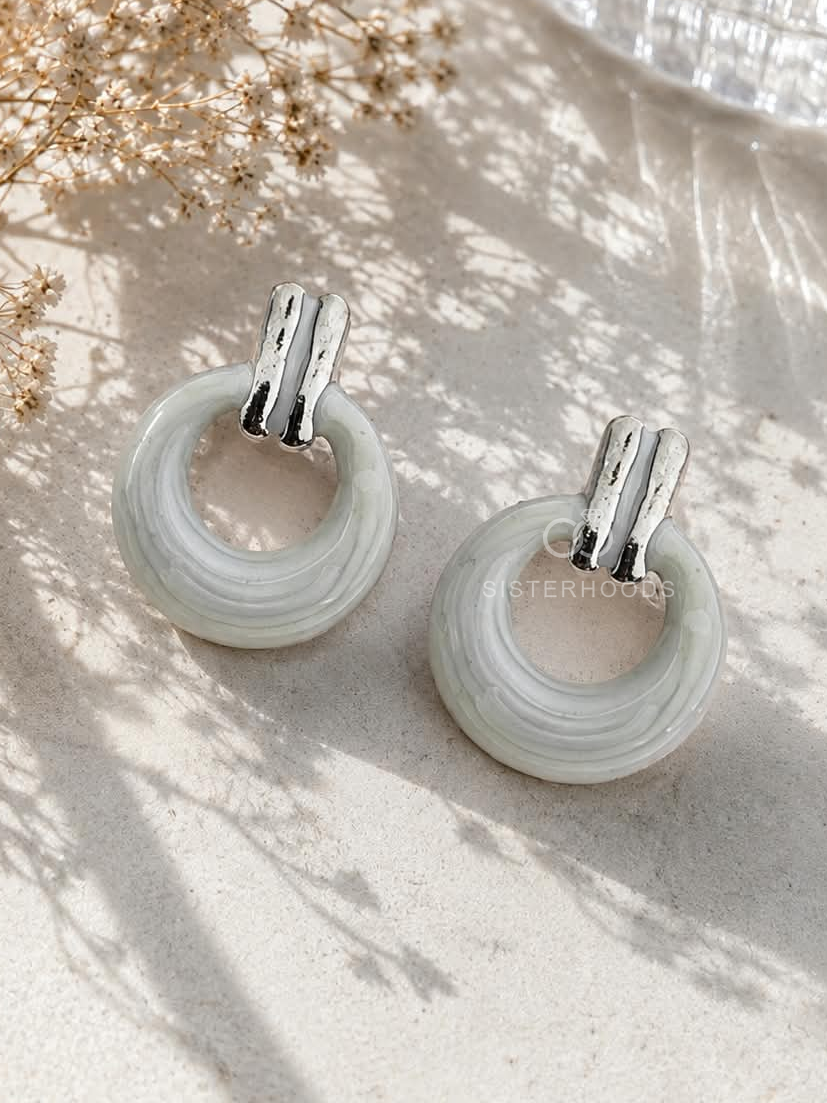 Ivory circular hoop earrings with silver-tone rectangular tops | SISTERHOODS-SHA256:3a1884561ec12cf0aef1d10586d1fbb2ce9ff0565d8248353518d72856a14039