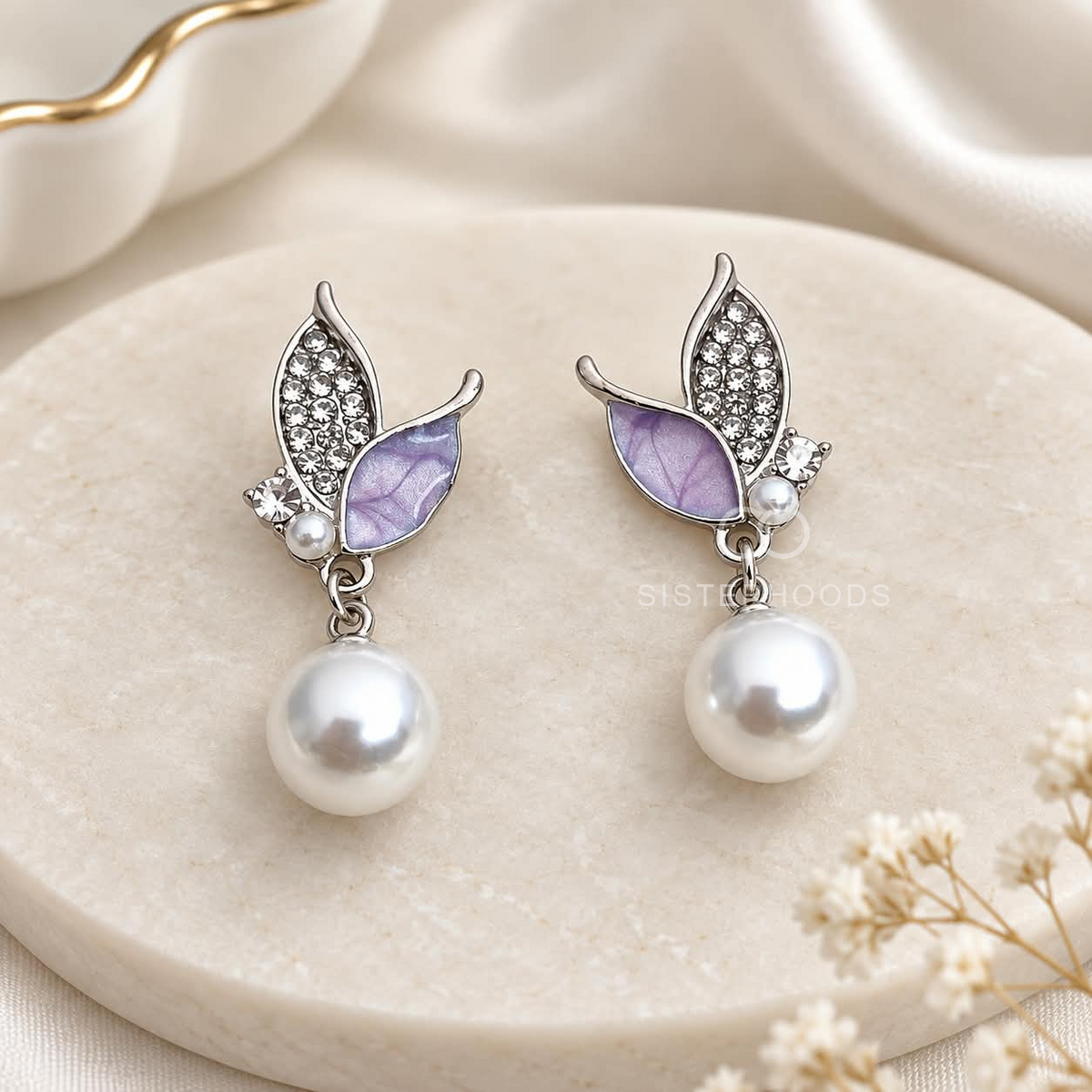 Silver and lavender leaf drop earrings with white round dangling accents | SISTERHOODS-SHA256:9c2639148a8e2725670aba0cdac64e146b39eee29f6579ef9d412e68bfe084db