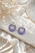 Lavender circular hoop earrings with silver-tone accents | SISTERHOODS-SHA256:b803c0977905d5692dfeb1925efd307a024cca85d52219b721b4ccc273cb5d28