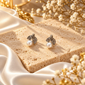 Leaf-shaped crystal stud earrings with white pearl drops | SISTERHOODS-SHA256:c65e3ec0933c071b891aa0d72ddf09bfc880ad0d326ae5dfb3e083c0c92ed2c5