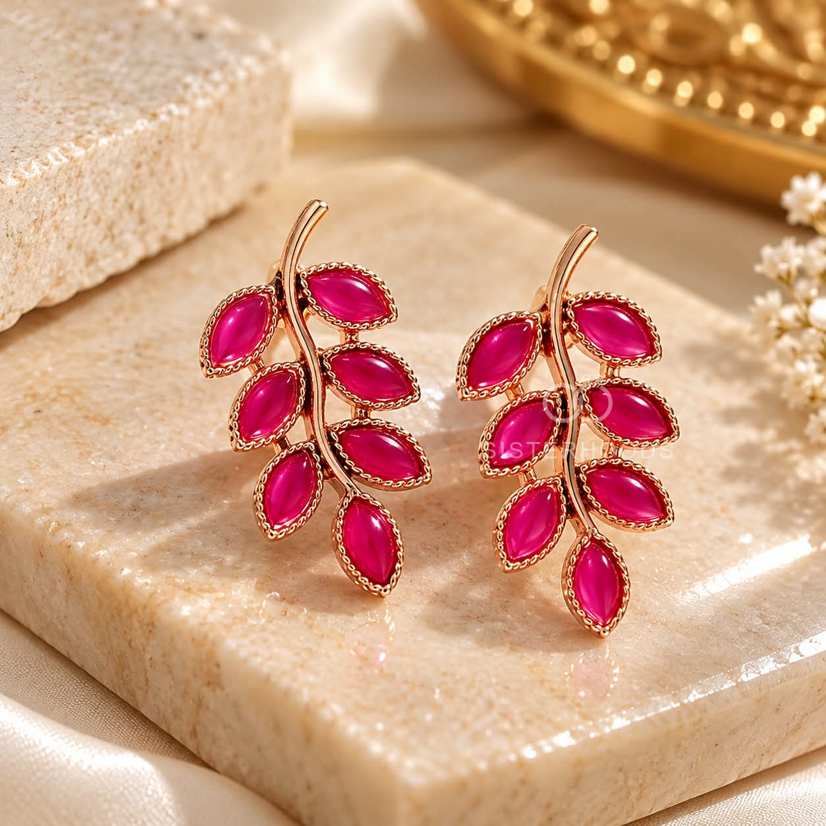 Magenta leaf-shaped botanical stud earrings with rose-gold-toned detailing | SISTERHOODS-SHA256:adeec677afaf9906eb277ba8e0386fd3e39b28d61dbd03f92a6235fd746bc3fb