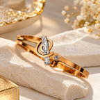 Gold-tone open bracelet with geometric details and crystal accents | SISTERHOODS-SHA256:d3c0a06d6c88b1d8107bc3fd3b50558511956ae9f31317517cd5c055a311344a