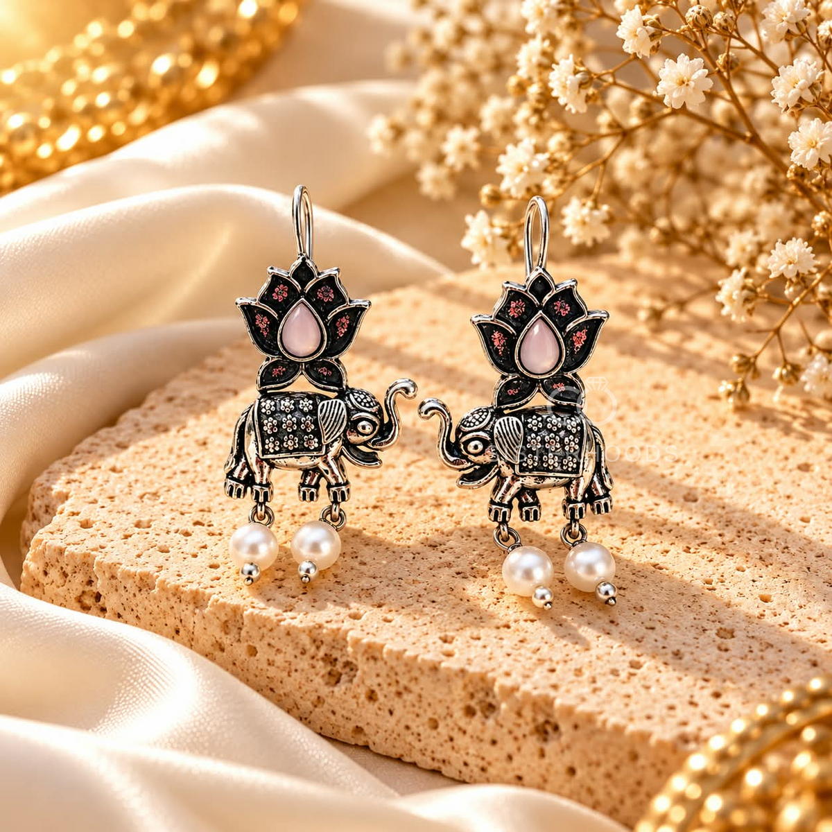 Oxidized elephant and lotus dangle earrings with black, pink and pearl-like accents | SISTERHOODS-SHA256:d227f3bb411224d299fe2500359a639d0bc3daf1d115d65e06ad1d81bb97d1b3