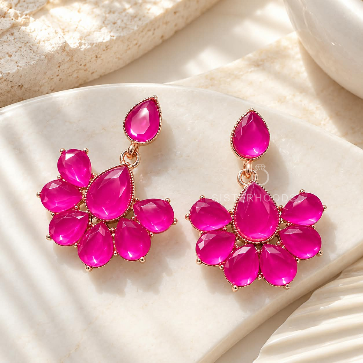 Pink faceted floral dangle earring with a teardrop centre and petal design | SISTERHOODS-SHA256:94a2b49bfbbcf07994ba119405f6ee10cb2c68f0adbcbe9a1bfd35f23d96172b
