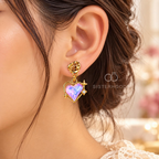 Gold-tone Korean dangle earrings with iridescent heart charms and star accents | SISTERHOODS-SHA256:801cea7e31157d966ef1b43e66cd7ce10cf351582bbbb2b31319343f0a834c8f