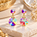 Round multicolour faceted dangle earrings with gold-tone details | SISTERHOODS-SHA256:412cf11d1a14b805692308e9dd11a874f8eddfe423b84eb03e393d82d119fd4a