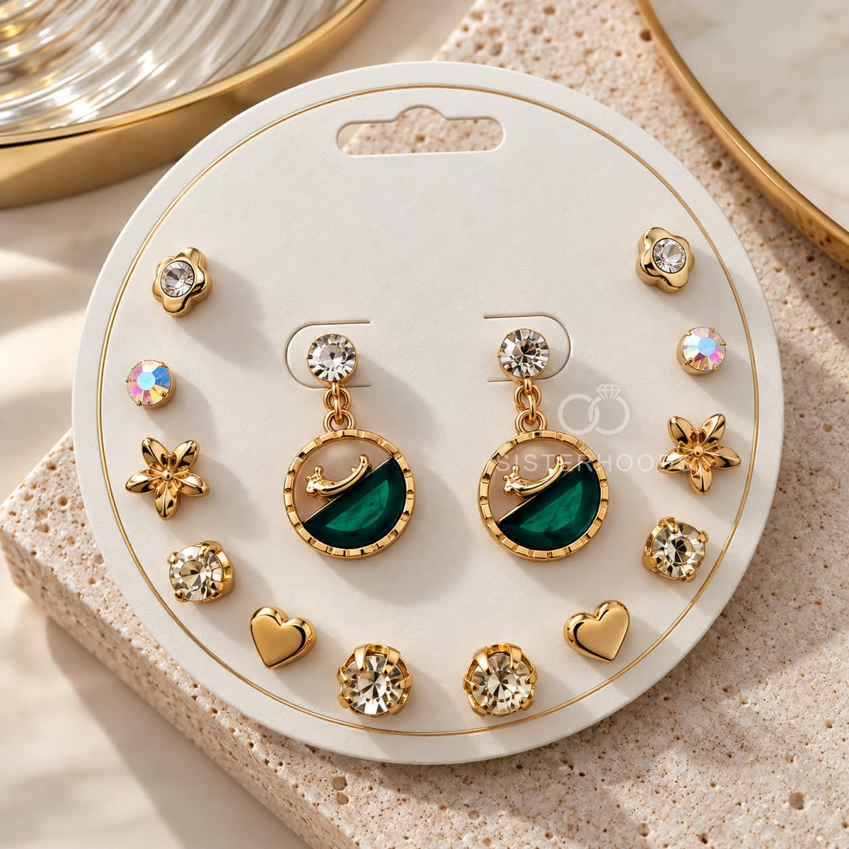 Gold-tone dangle earrings with round green accents and sculptural detailing | SISTERHOODS-SHA256:c5a4db766183c440edf2b7ce4ebde04a9387b4d3966898f49d9a23116c0c7761