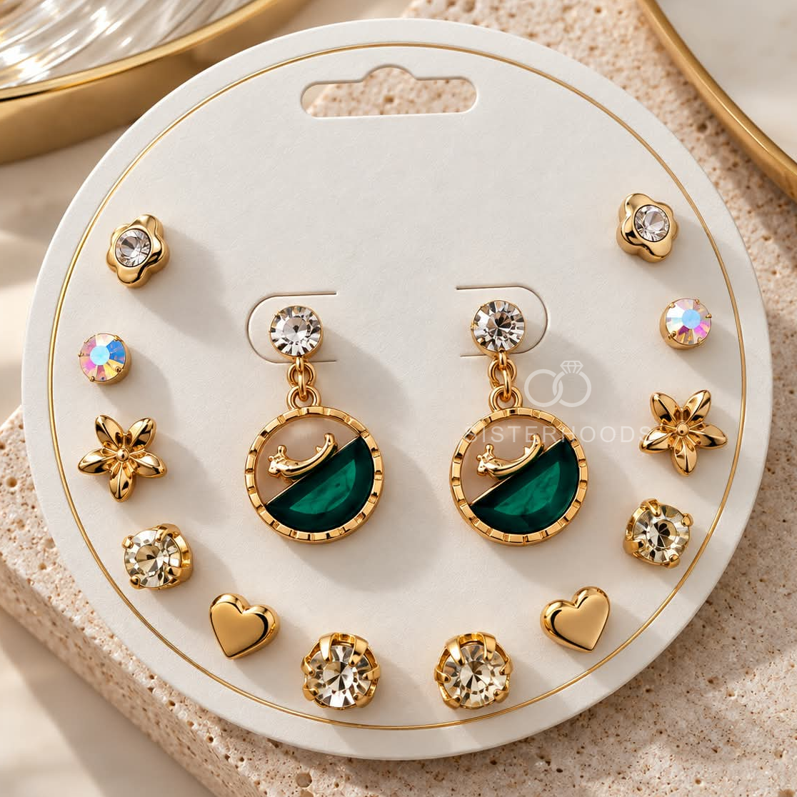 Gold-tone dangle earrings with round green accents and sculptural detailing | SISTERHOODS-SHA256:2ad4ea3a86830f58107dd5bad748432e8ed6e8df4f14fd792bfbd6c24494a856