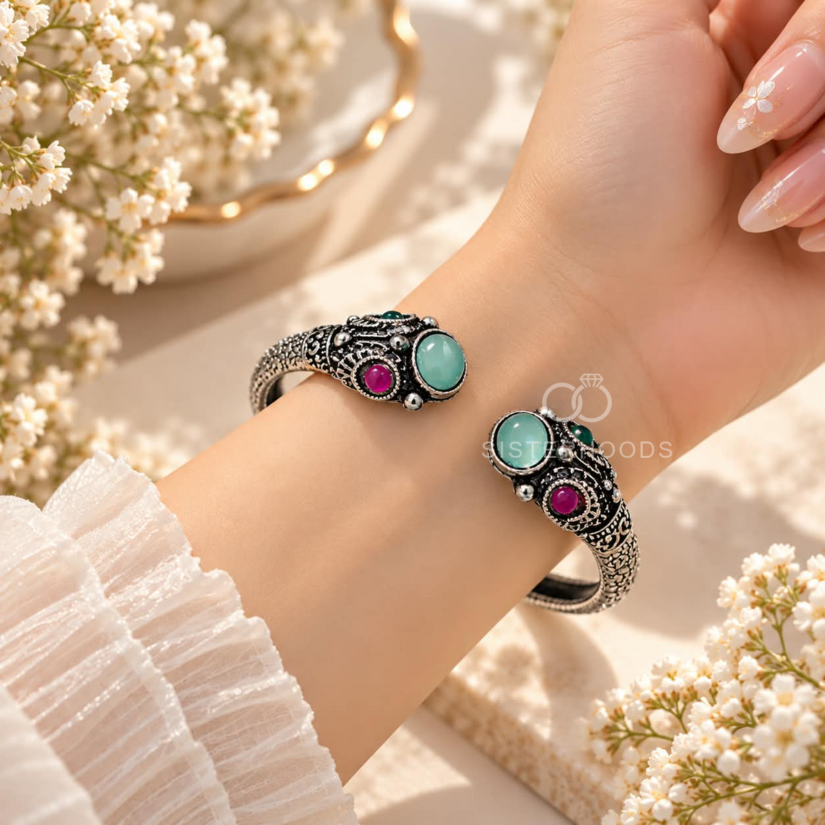 Ornate oxidized cuff bracelet with teal and pink accents | SISTERHOODS-SHA256:22c47dbbde1c4e079642053da2f0d324960ab0fbc98dda1af3f7b1c9fb00577f