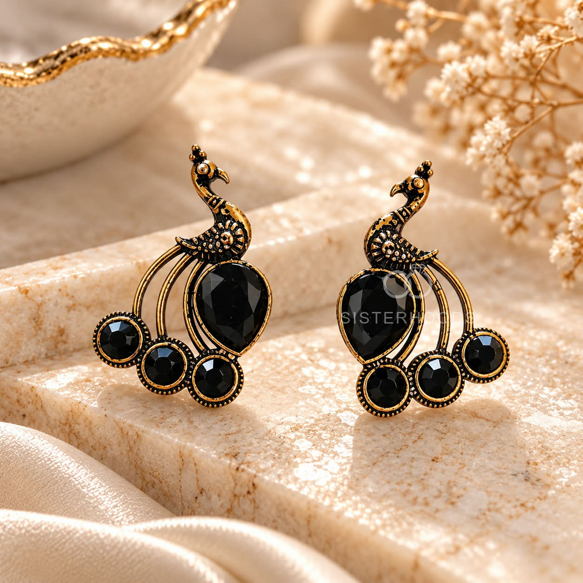 Black and gold peacock-inspired oxidized dangle earring with circular accents | SISTERHOODS-SHA256:d38d0b19be51b0017312755fc74fc64e179a61907b29cea8fb258bc31ef6cde6