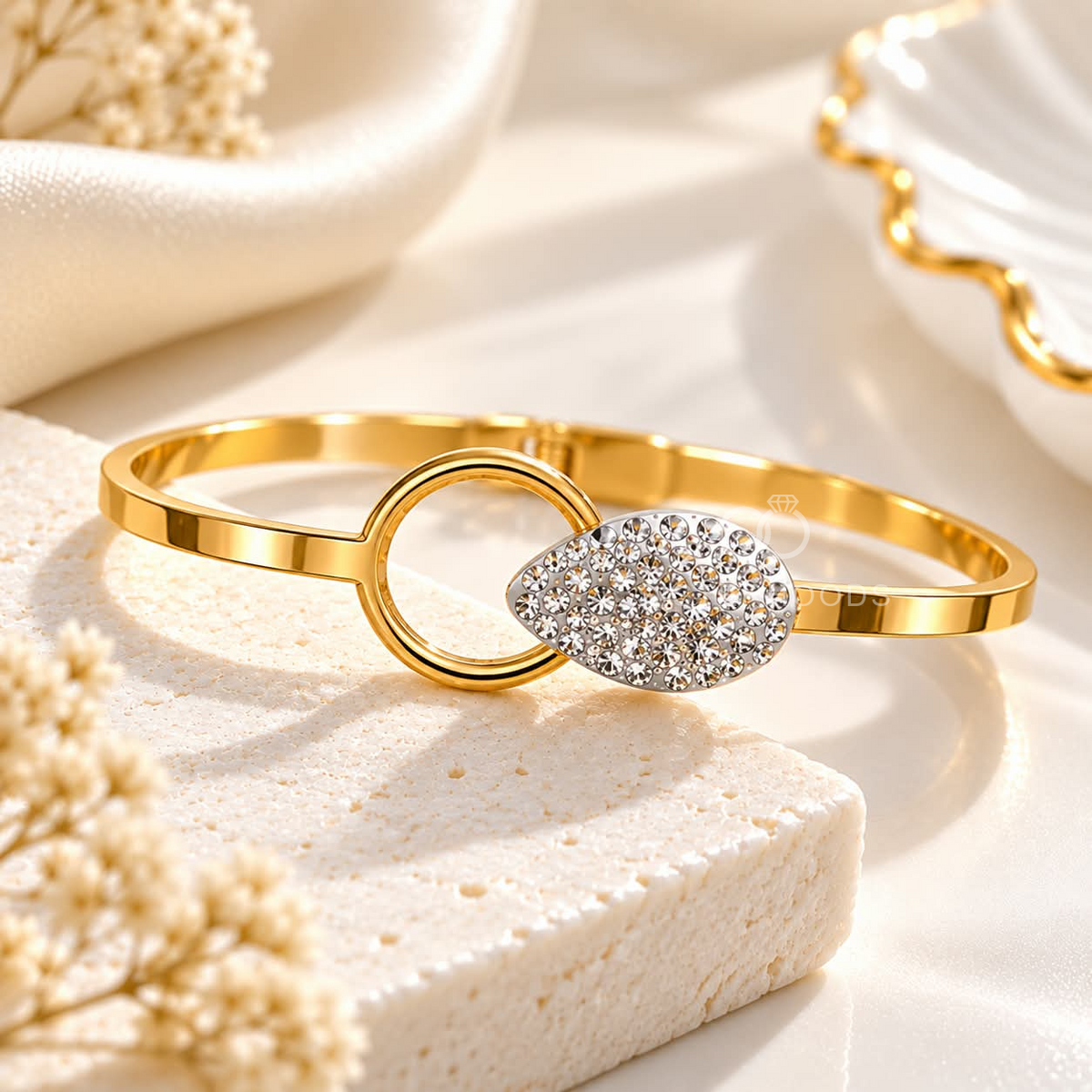 Gold-tone bracelet with crystal-studded oval centre and circular accent | SISTERHOODS-SHA256:53a657ead0ec9537ec2b26c02c9acb9ed4cf02c7e3d95b87f84cc581b9d0fdf0