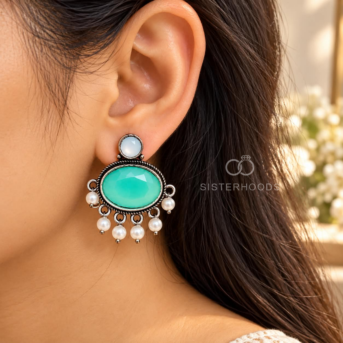 Turquoise oval dangle earrings with white bead fringe and dark oxidized-style detailing | SISTERHOODS-SHA256:a660cfd7671e9a7ce42b89592d2c93511787a04d15b2fcf0c297a38e82154997