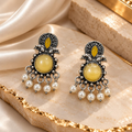 Oxidized-style dangle earrings with yellow centre accents and white-bead fringe | SISTERHOODS-SHA256:8a9a2d5265feb676ef8bd504908c0c87d3c22eea97a7a7c9f0e13cfea2c743b9