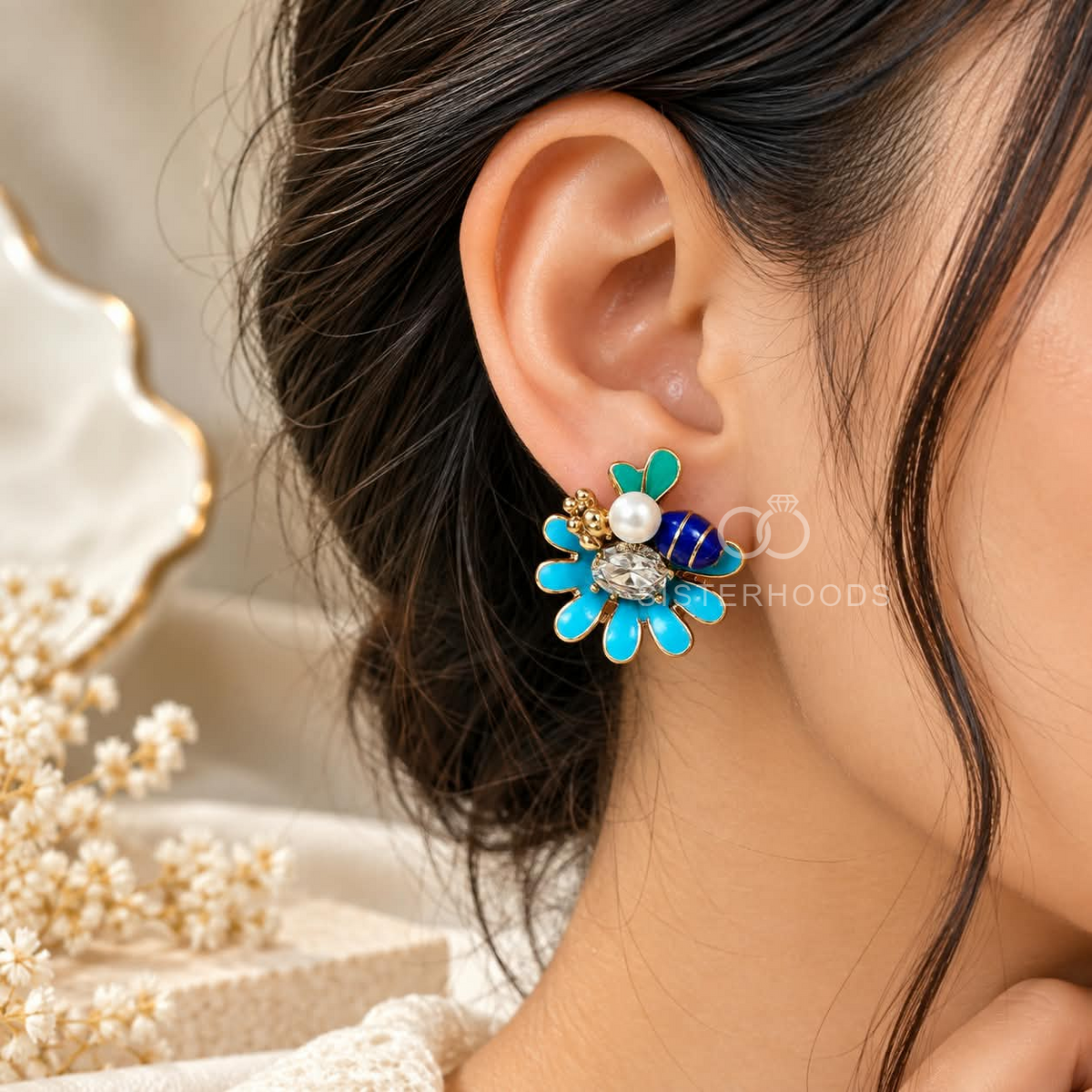 Blue floral stud earring with pearl and faceted centre detail | SISTERHOODS-SHA256:52adb6dfdc76f4b13feeb69b9425f8c970ae0b41c1c9b8c551b2e6fbedfdbad0