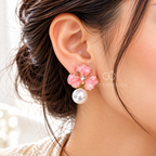 Pink petal cluster stud earring with a white pearl drop | SISTERHOODS-SHA256:f9677b31751578dbfee7a318bfca18ed8d18d14fd79dfbd7a886e57fa6a9698e