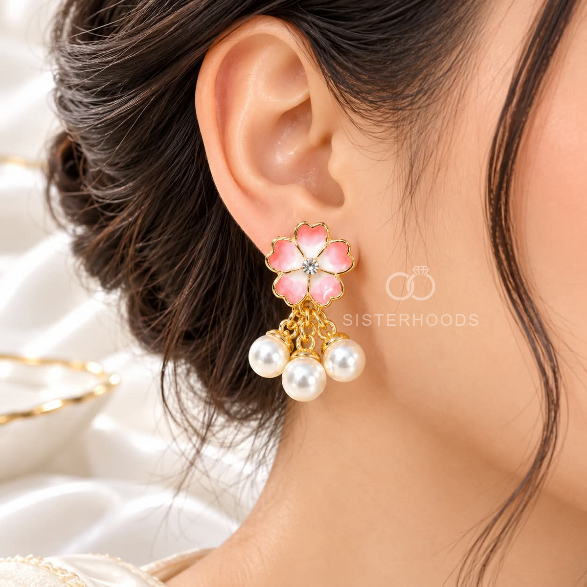 Pink floral dangle earrings with white pearl accents and gold-tone detailing | SISTERHOODS-SHA256:047c01ade9a9840a21a0956afab3a4bd69c945298d3c36196fa840f6ea2042eb