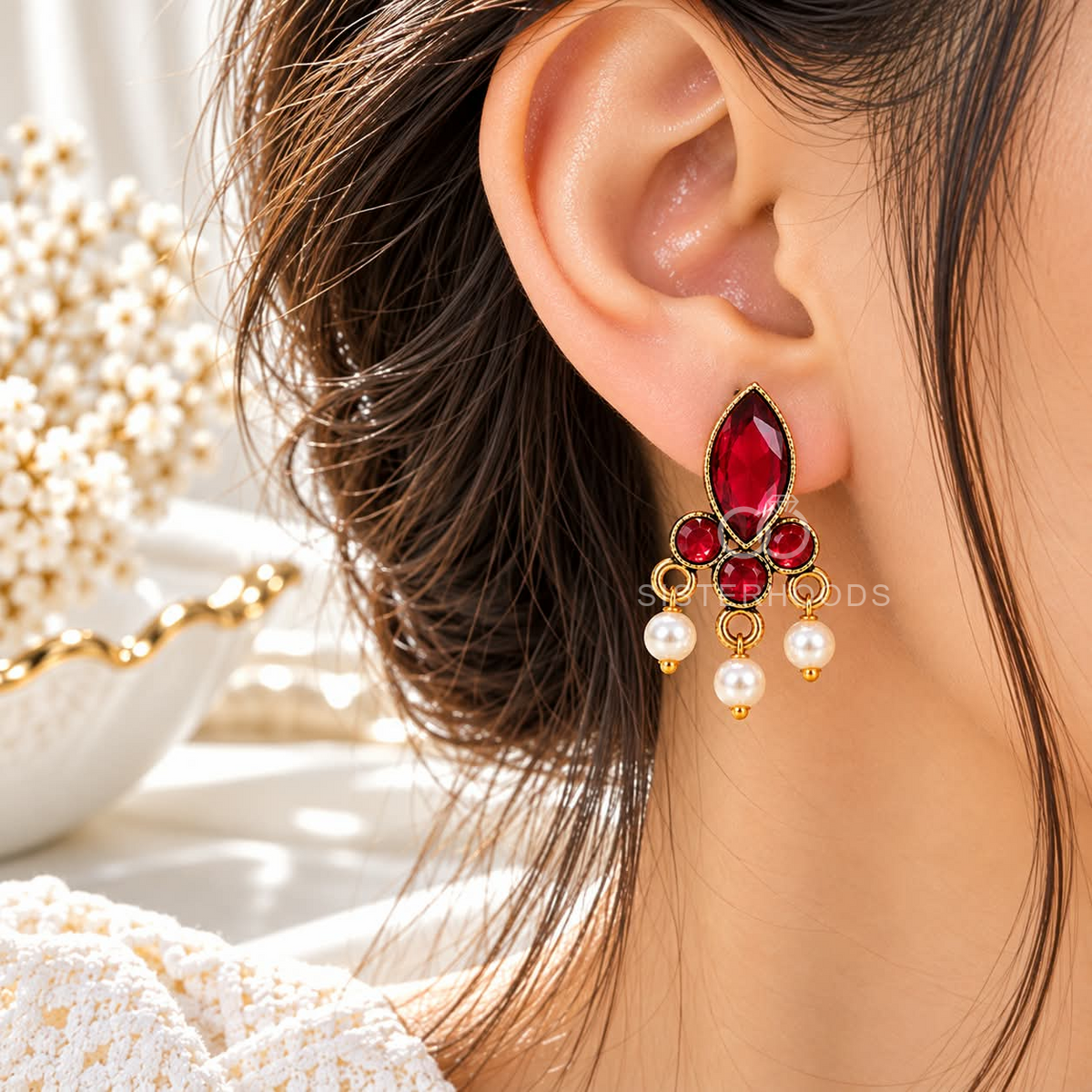 Gold-tone dangle earrings with red faceted accents and white bead drops | SISTERHOODS-SHA256:64b710af2485355022dc9a4fd4bd59522933f86242c38afe599247cb1c32c75c
