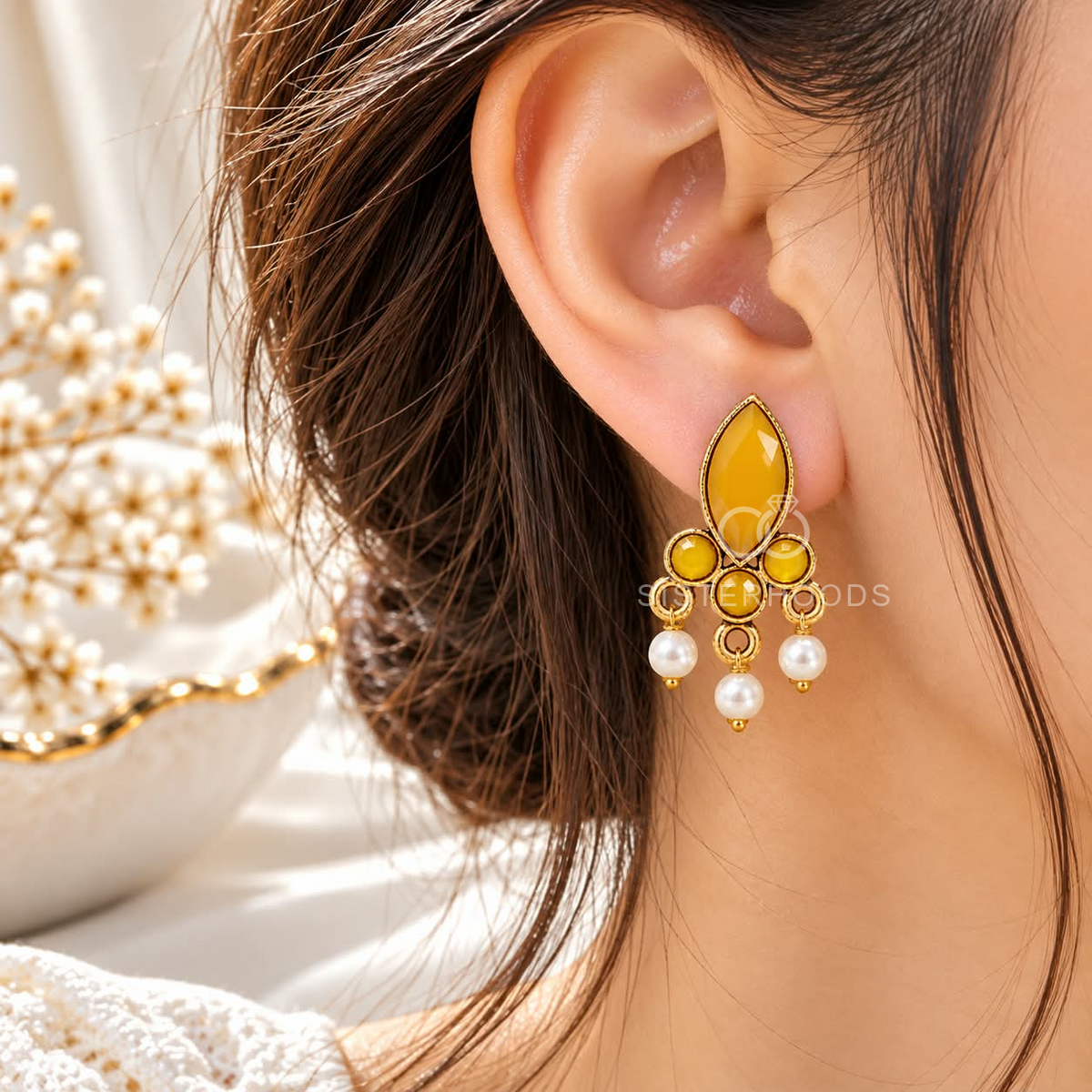 Gold-tone dangle earring with yellow marquise accents and white pearl drops | SISTERHOODS-SHA256:5f3fd1bd2a1eeb667dc4fbae01e9c40e728b1dd10126b60be99159505df1aba0