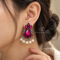Ornate oxidized dangle earrings with pink accents and pearl drops | SISTERHOODS-SHA256:bd8b5ad1129cab19372201dfa83f1c505e005d9c3148d5ce7e0f599243f8e9f5
