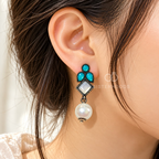 Oxidized dangle earrings with teal accents, geometric square details and white pearl drops | SISTERHOODS-SHA256:1a6d9a6e5dde9a6f08da58929147ba9af0b8e025feb32783b8b7d1302f1d9788
