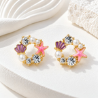 Multicolour pearl stud earrings with shell, starfish and faceted accents | SISTERHOODS-SHA256:6355a9e2e4de888114cd2656058844019d3cb74fa04fc0ca43dffd2c79f5d79f