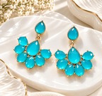 Turquoise faceted floral dangle earrings with petal-shaped drops and gold-tone detailing | SISTERHOODS-SHA256:cc4911ae14149e9760aa0fcbe4bf9325a182f4f35489f4b43628ab18df794e37