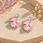 Pink floral dangle earrings with pearl accents and round faceted details | SISTERHOODS-SHA256:02fc2cd583de7c00ac424f7da2fa35ea29056d05db516dc3a37befaf485e1144