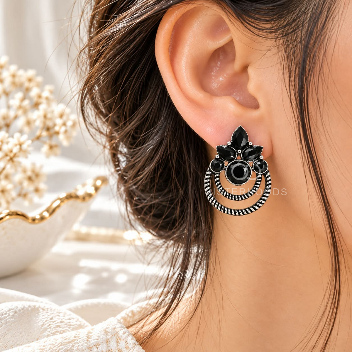 Black stone oxidized dangle earrings with petal accents and circular detailing | SISTERHOODS-SHA256:79398352beef13082b26985b10a09bd7f2b5d7a19102b81f8872e2126fc16cb5
