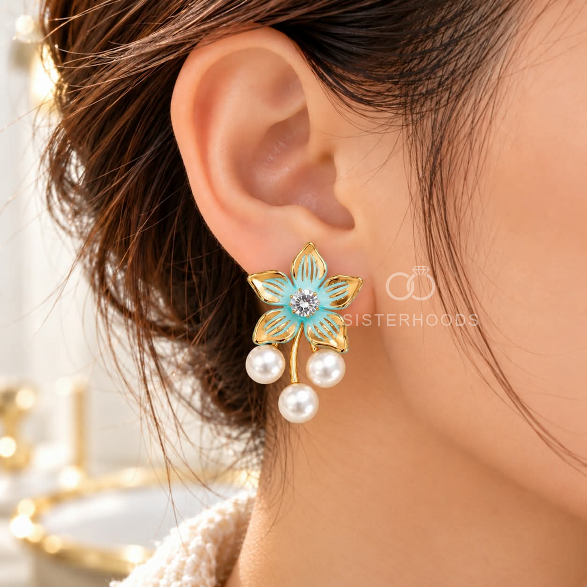 Turquoise floral dangle earrings with a sparkling centre and three white pearl drops | SISTERHOODS-SHA256:a1d26811e3394134fc540c76a65c7917c373bbac20c5506530ca120b994f439d