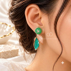 Green and pink leaf-shaped drop earrings with round green tops | SISTERHOODS-SHA256:410f3cbe2693887797321997845b5a52c32f82af30112d1a9e5b7224285f570c