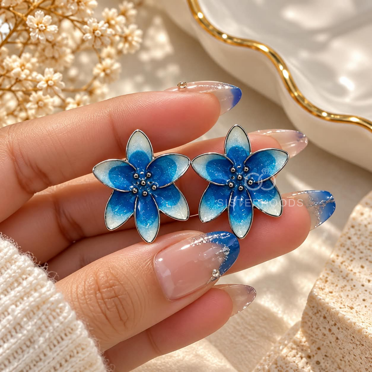 Blue and white floral stud earrings with gradient petals | SISTERHOODS-SHA256:989498cb255d615ec1f2c4215f83059a6c9180155a67d74f3c25b7f1d489c13b