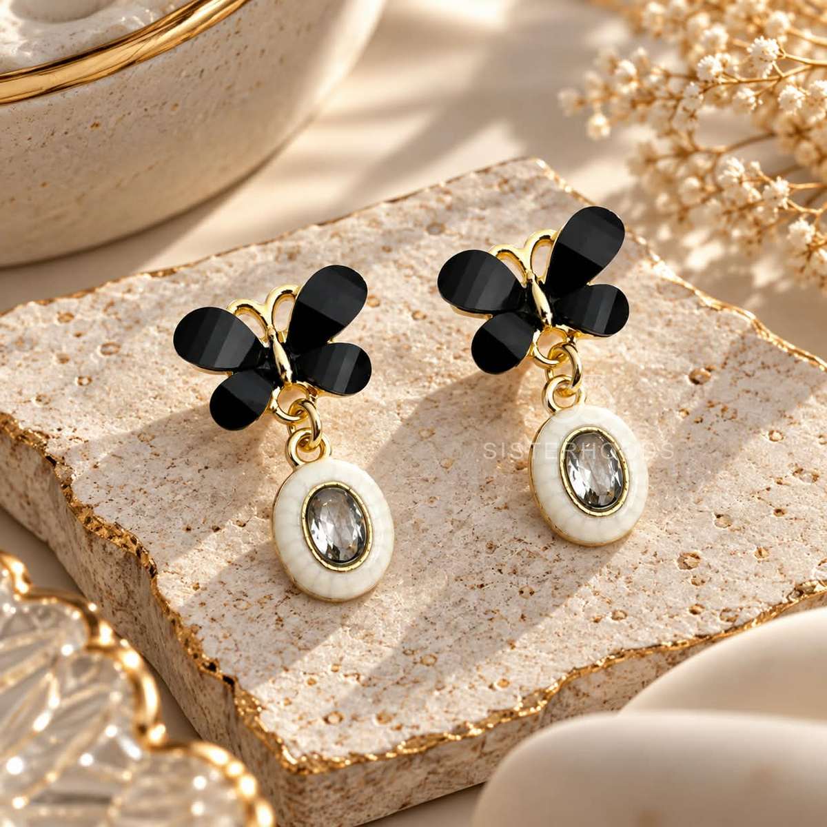 Black floral cluster dangle earrings with white oval accents | SISTERHOODS-SHA256:f1ef1a3a59ac8b93f5add2fe37d9fbcabd2dbce11c7f5037f04546ea119e3bab
