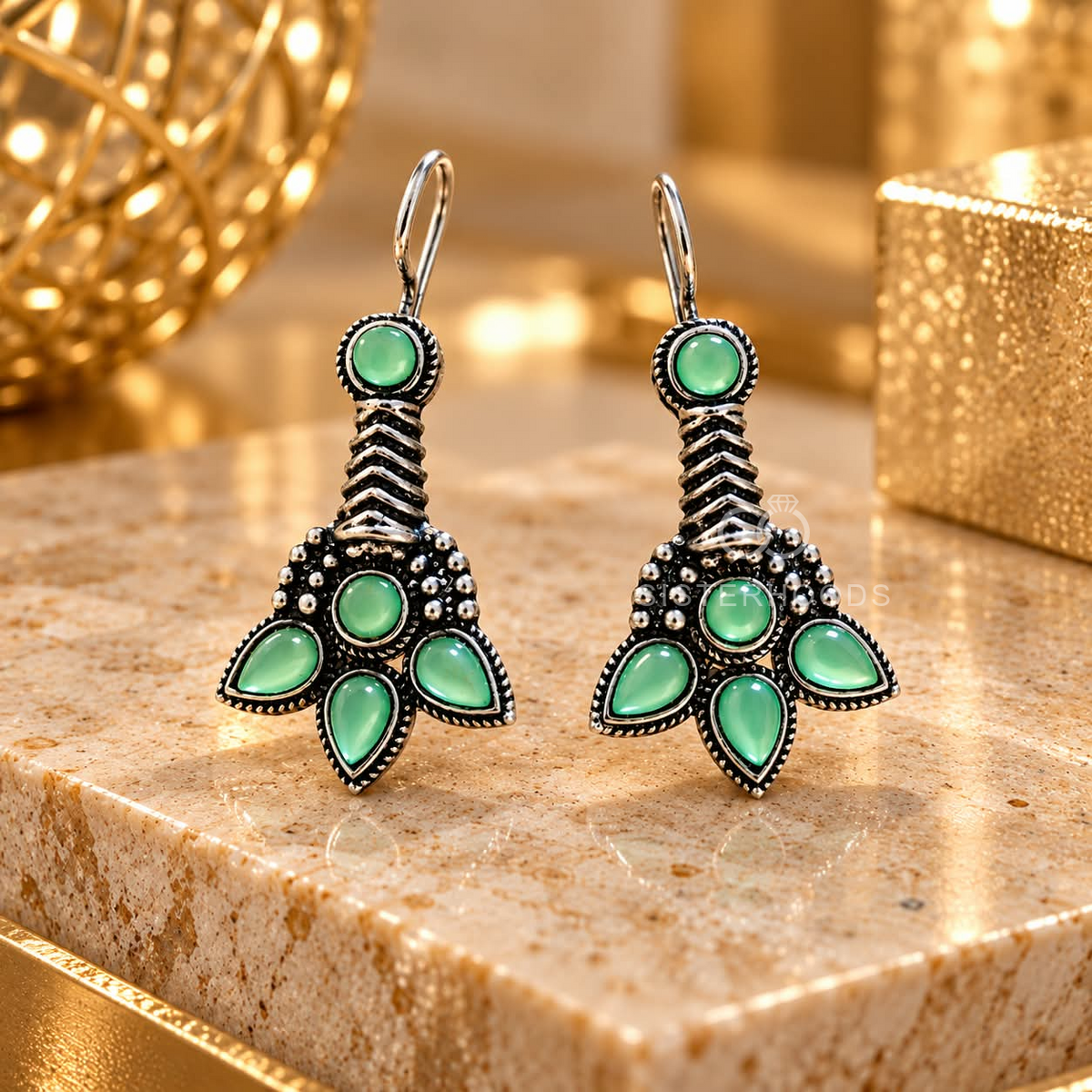 Green floral oxidized dangle earrings with round and petal-shaped accents | SISTERHOODS-SHA256:e810a9801f0bb0ac210a45e864a0ca95e15f863cfa5505ee90dd335ad7191e34