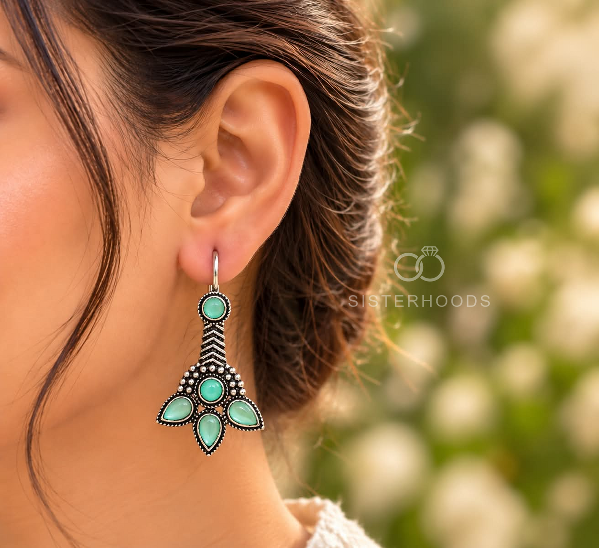 Green floral oxidized dangle earrings with round and petal-shaped accents | SISTERHOODS-SHA256:882a34844858377558bdac993f403ddb0f6b1cd0e5d642b76ac61e8be0135194