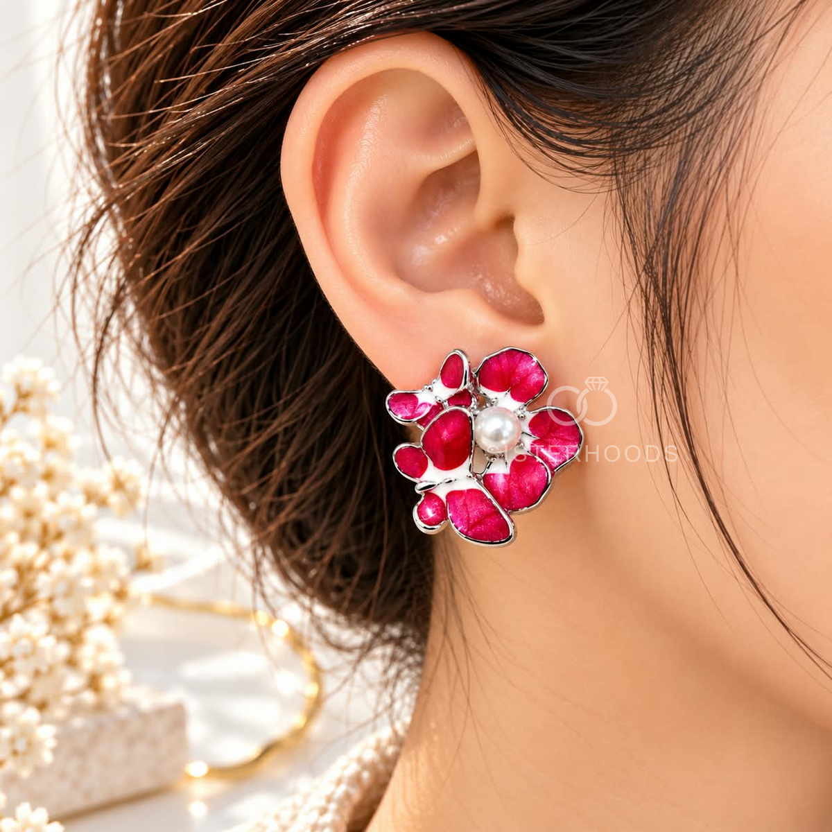 Pink floral stud earring with a central white pearl and silver-tone detailing | SISTERHOODS-SHA256:29aac1adf7bd71889532b1f71e19fc77c696f8f5e6f558c41fe66a5624fd6300