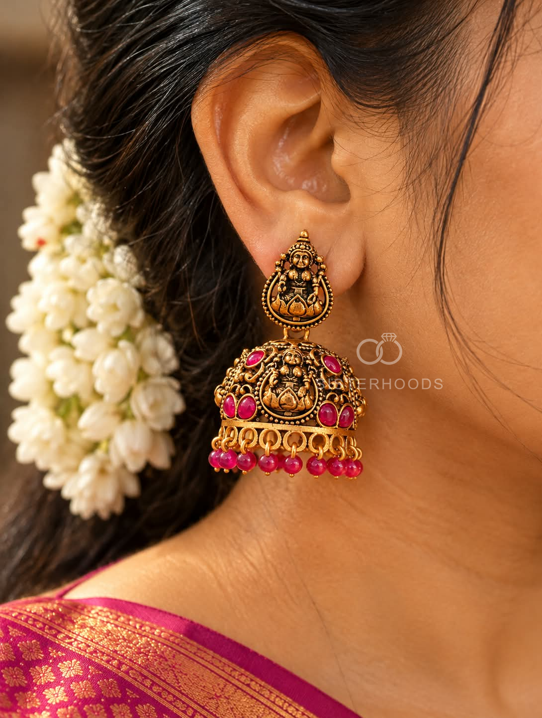 Ornate Lakshmi motif jhumka earrings with pink bead fringes | SISTERHOODS-SHA256:7c04e63b9bfb3385e46abf127c988795e2711acb874fa916ecb15908c3353a17