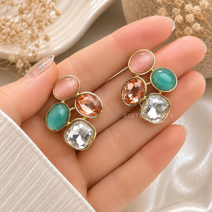 Multicolour geometric drop earrings with pink, green, peach and silver-toned elements | SISTERHOODS-SHA256:75cc65ad00508669e963956075212cf862b093782b3415ed34ed35b1db90cc47
