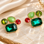 Colourful geometric dangle earrings with green, teal, red and lime faceted accents | SISTERHOODS-SHA256:e561d60fb30f27745866057a9da5c058b15dad784d0a8d4063dcc537f42303a5